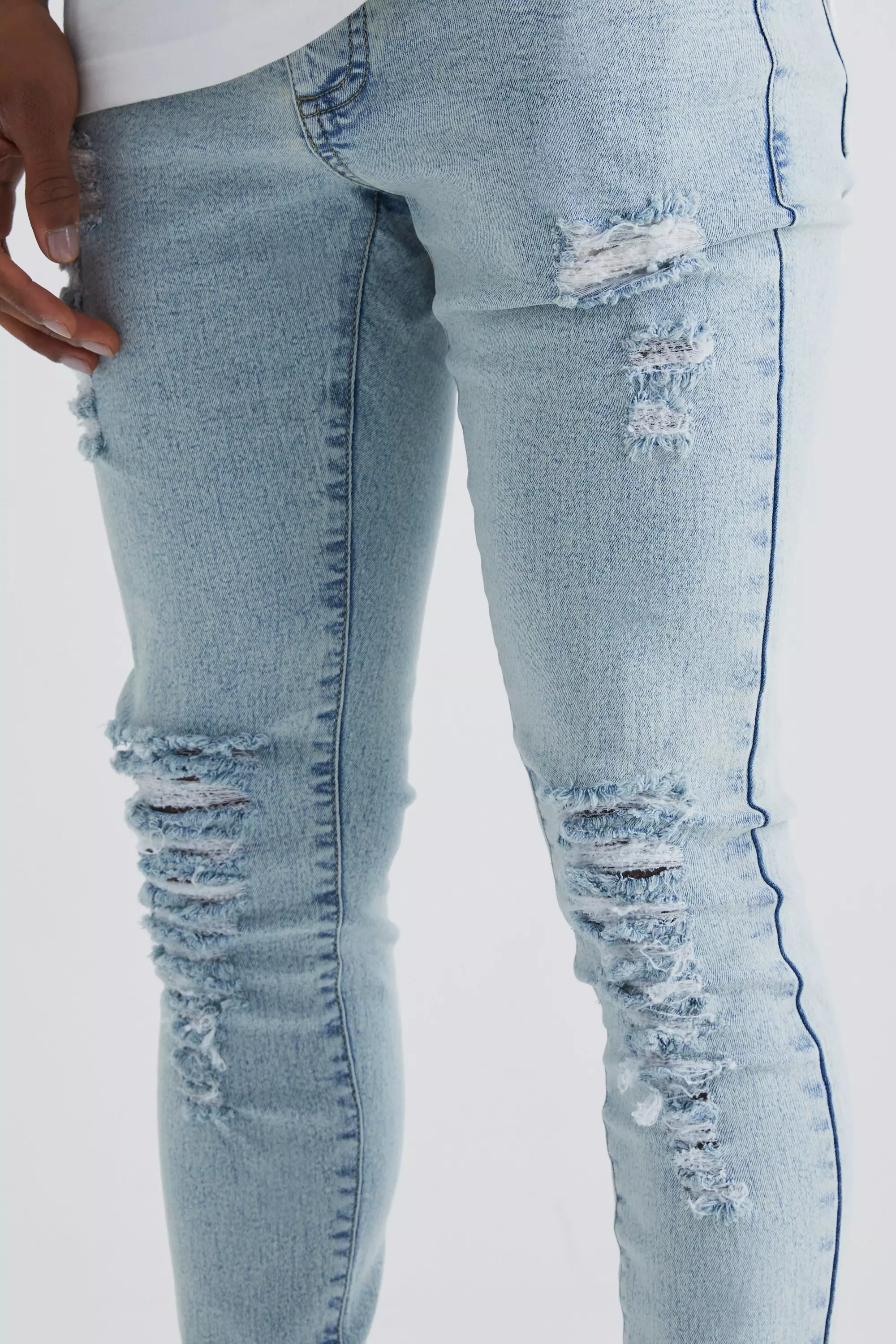 Super Skinny Jeans With All Over Rips | boohooMAN USA